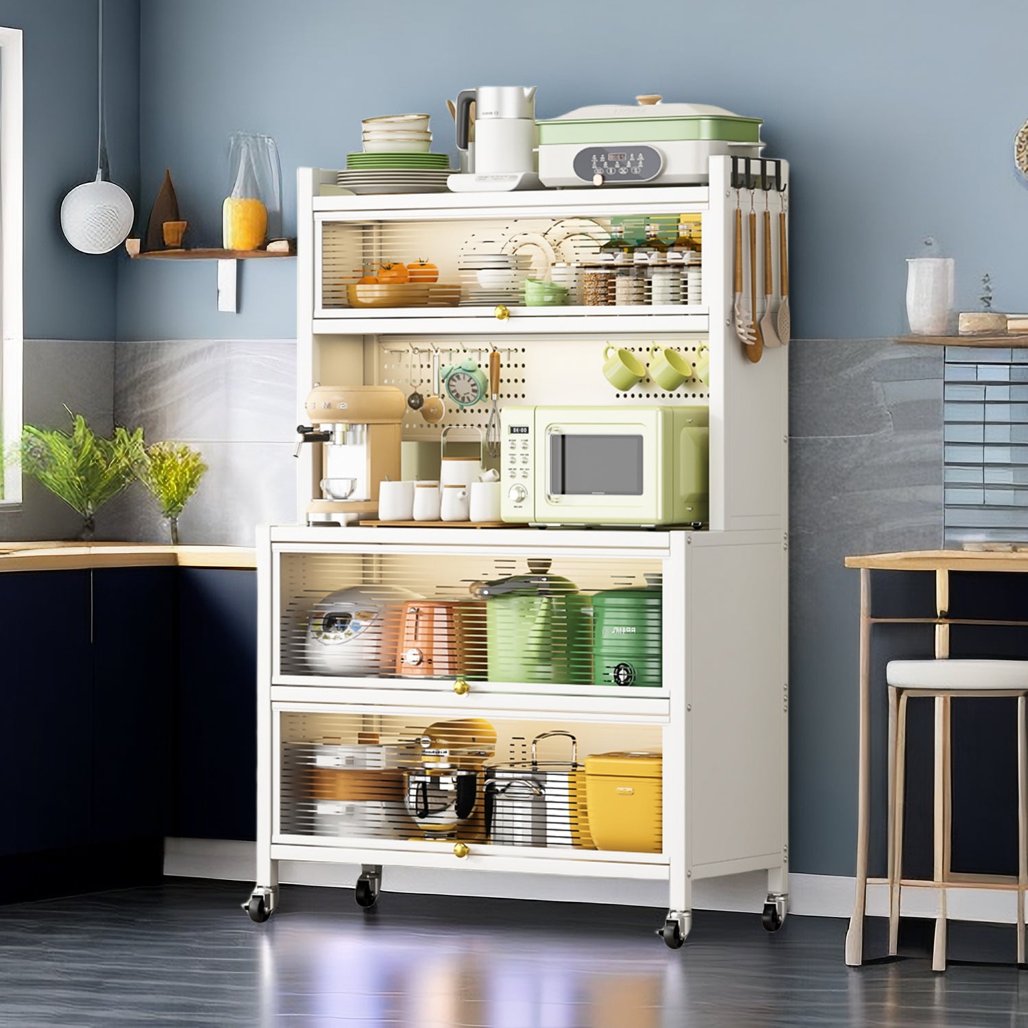 White metal storage shelves in a modern kitchen displaying various kitchenware and appliances for organized storage.