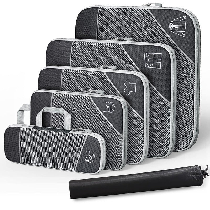 Travel compressible storage bag set in black, featuring multiple sizes for organizing shoes, clothing, and accessories.