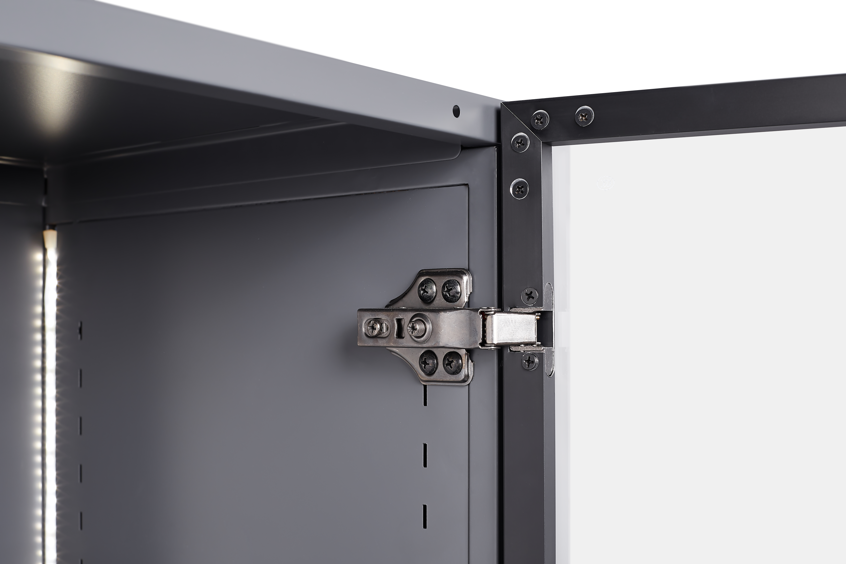 Close-up of metal hinge on a grey display storage cabinet, showcasing durable construction and modern design.