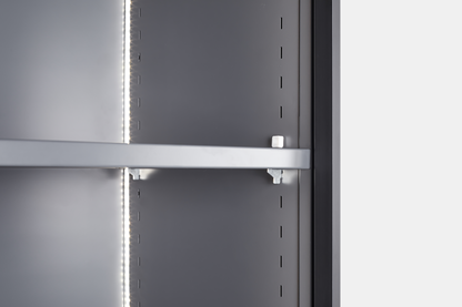 Close-up of adjustable shelves and metal support rail in a modern grey storage cabinet.