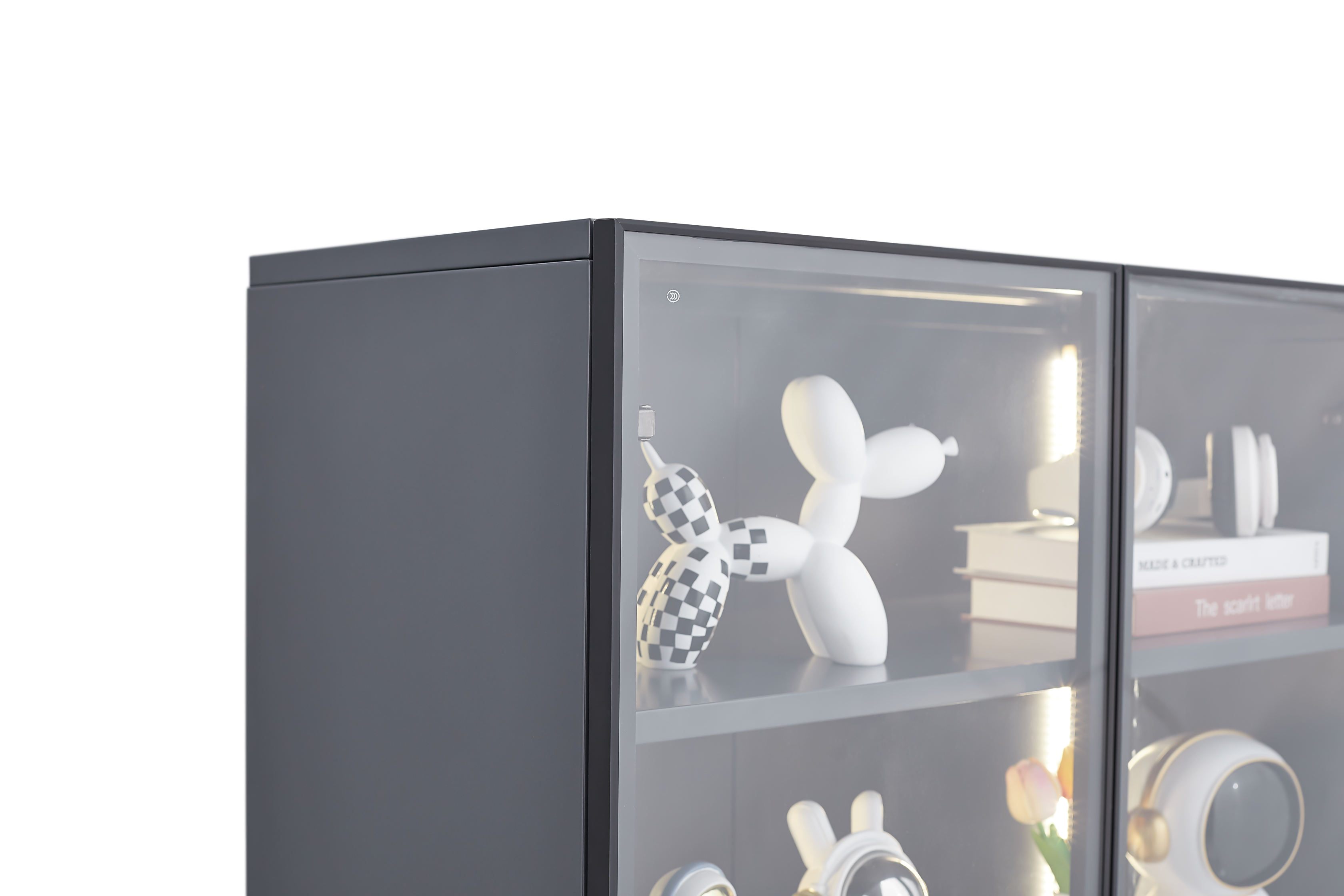 Modern grey display storage cabinet showcasing decorative items and books with adjustable shelves.